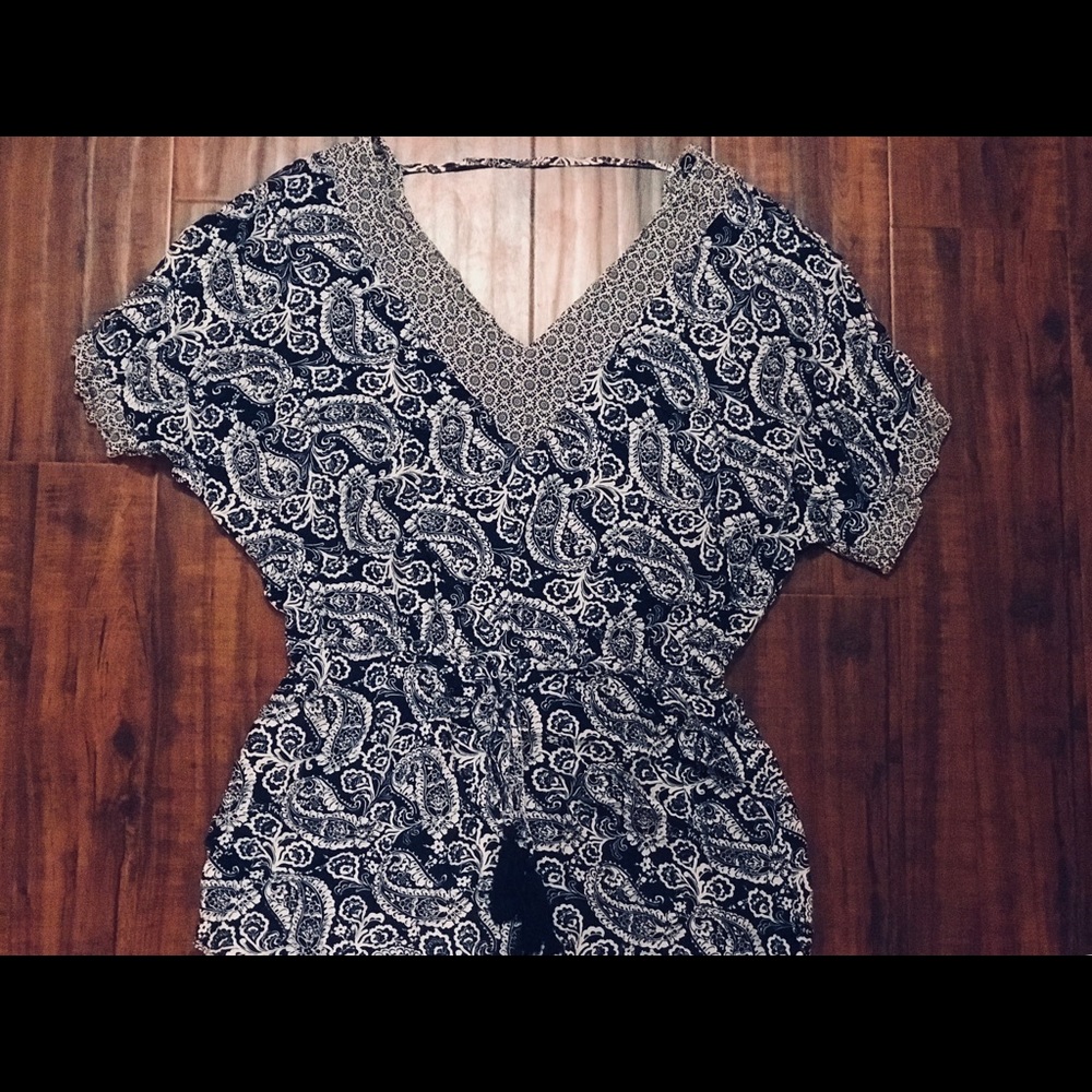 Blue and white paisley boho top with fringe tie.